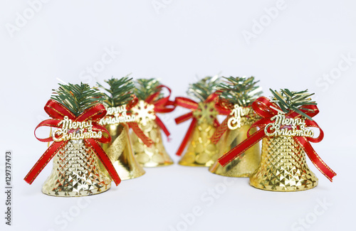 Golden Christmas bell design on white background