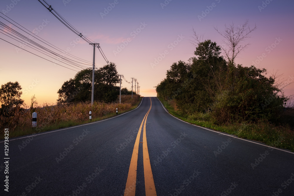 Rural road with beautiful twilight sky
