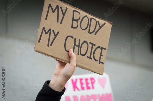 Pro-choice Planned Parenthood demonstration holding a sign photo