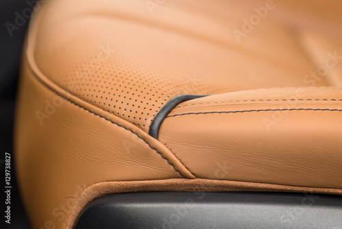 Modern car leather background. Detail of seat. Macro. © alexdemeshko