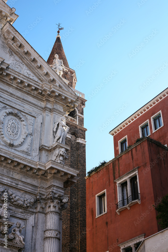 facade of church and house in Venice