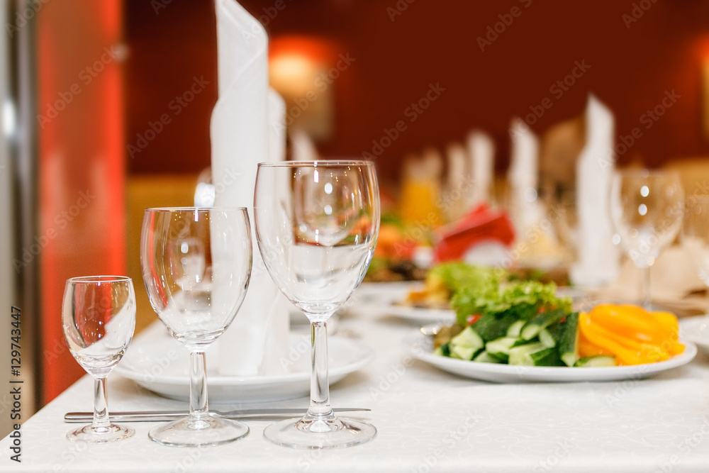 Serving table prepared for event party or wedding. Soft focus, s Serving table prepared for event party or wedding. Soft focus, s