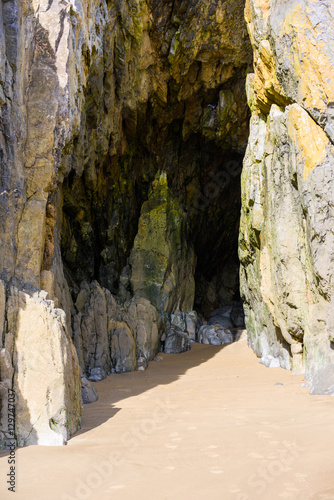 Looking in a cave Tenby beach