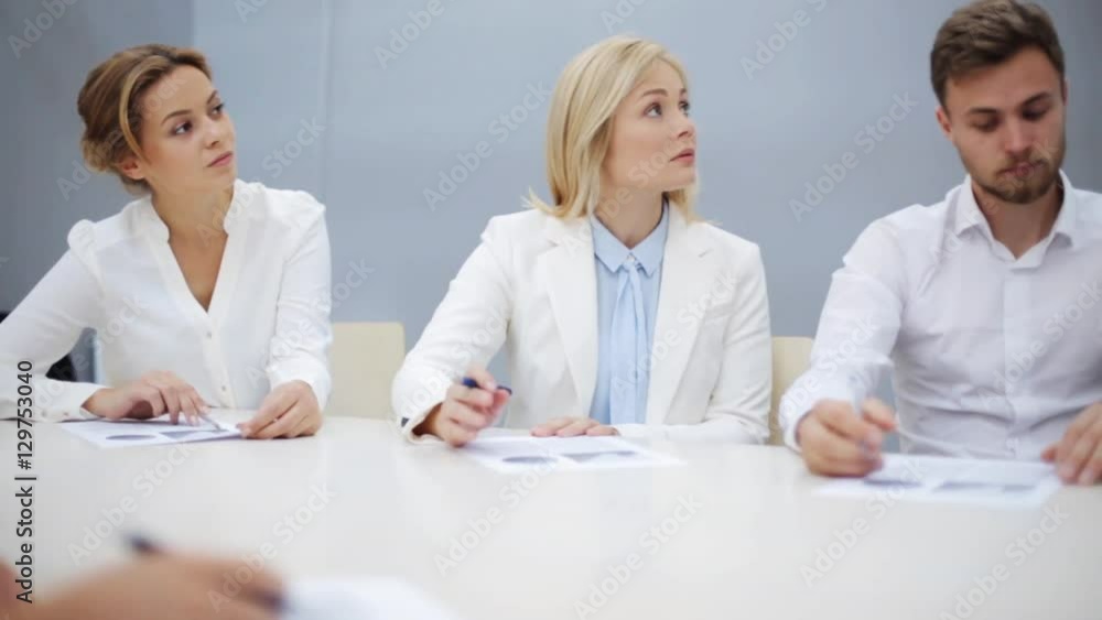 business team with scheme at presentation business team with scheme at presentation