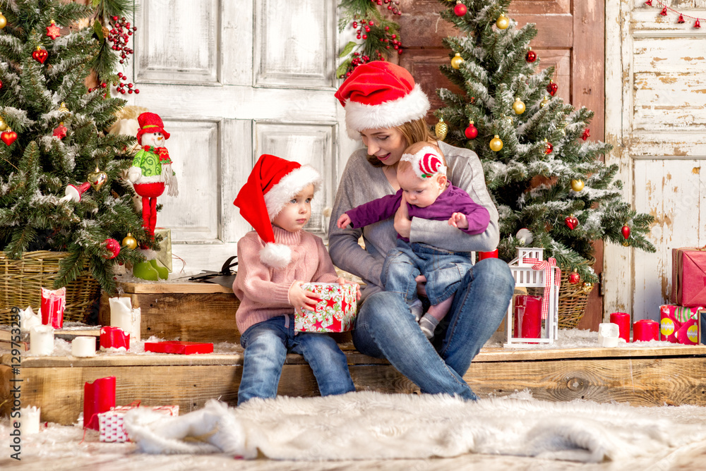 Happy family in Santa hat Happy family in Santa hat