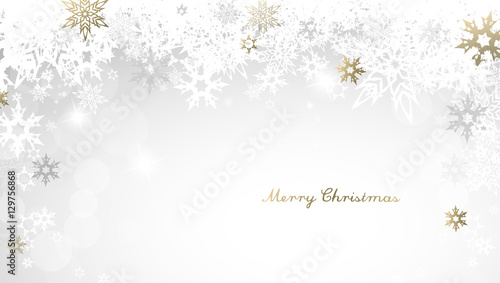 Christmas light background with golden and white snowflakes and