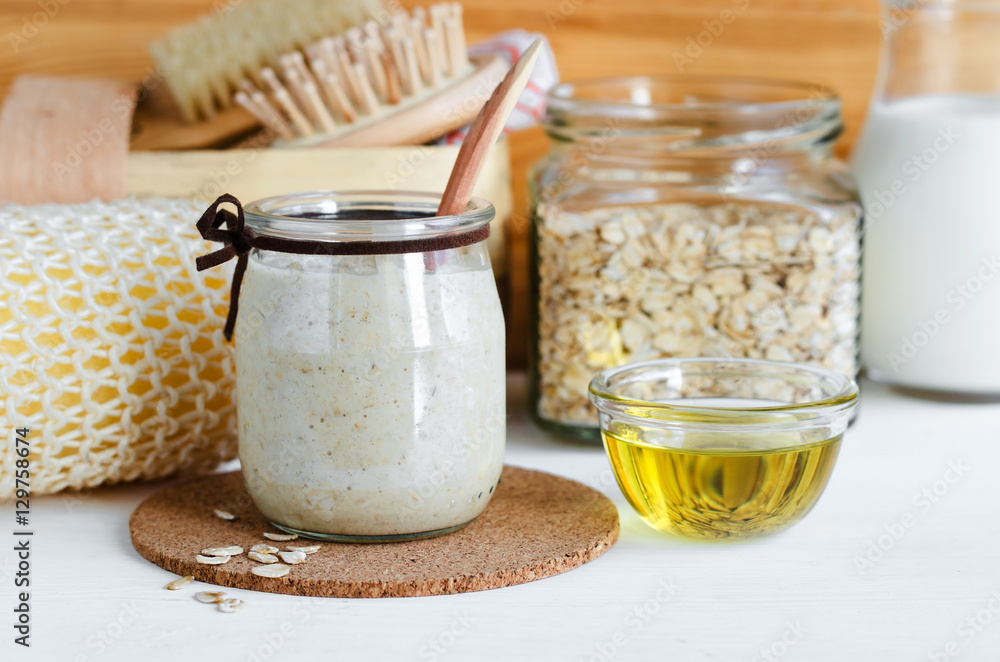 Homemade oatmeal mask in a glass jar. Gentle scrub for sensitive skin. Diy cosmetics. Homemade oatmeal mask in a glass jar. Gentle scrub for sensitive skin. Diy cosmetics.