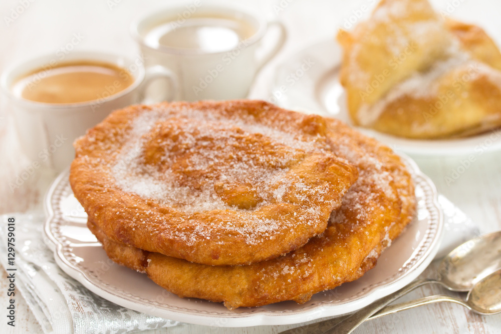 christmas portuguese cake Filhos with sugar on plate christmas portuguese cake Filhos with sugar on plate