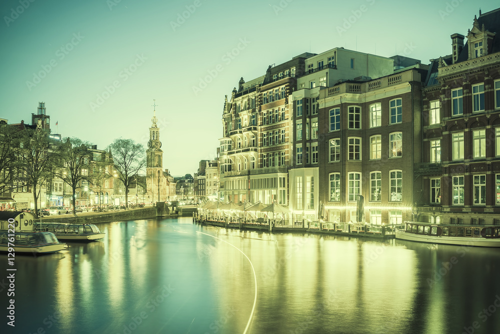 Vintage Cityscape with Night Lights in Amsterdam