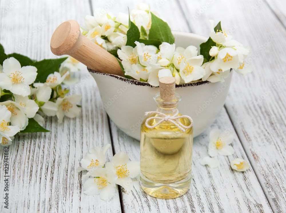 Massage oil with jasmine flowers