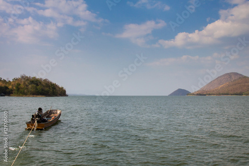 River view with towing boat in Kanchanaburi  Thailand.River view with towing boat in Kanchanaburi  Thailand.