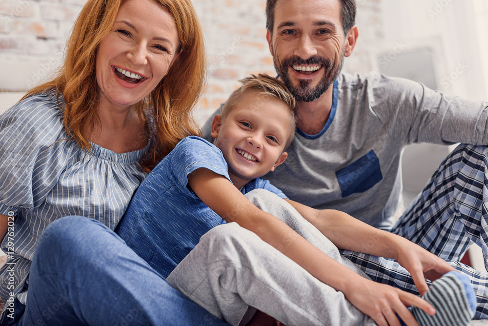 Happy family relaxing at home Happy family relaxing at home