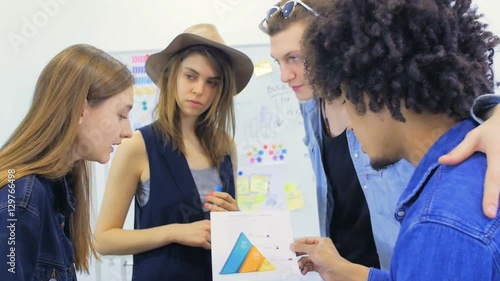 Young people work over business by the project