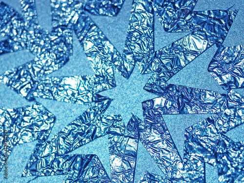 foil snowflake on a blue background
