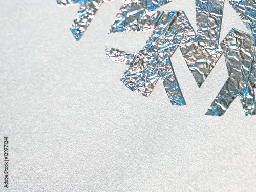 foil snowflake on a silver background