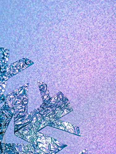 foil snowflake on a silver, violet, pink background
