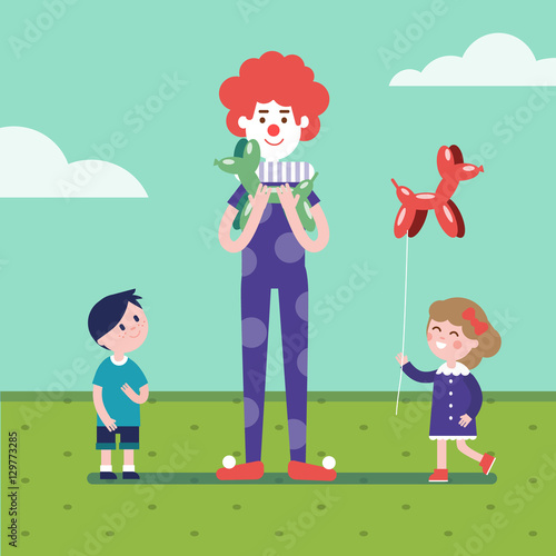 Clown is making balloon animals for girl and boy