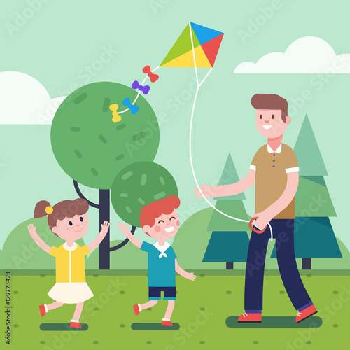 Father playing with kids and flying kite outdoors