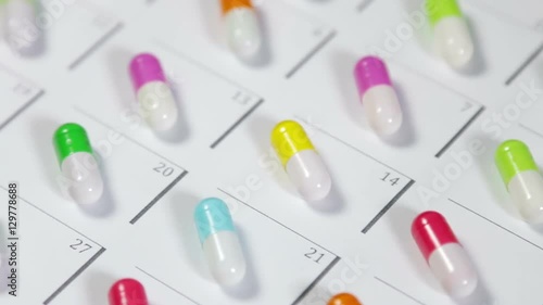 pills are of different color on the calendar. Schedule medication. video slider photo
