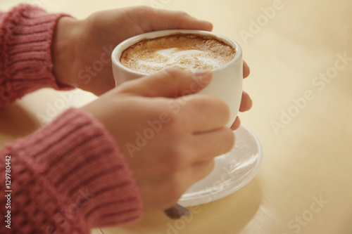 Wallpaper Mural Woman holding cup of coffee, closeup Torontodigital.ca