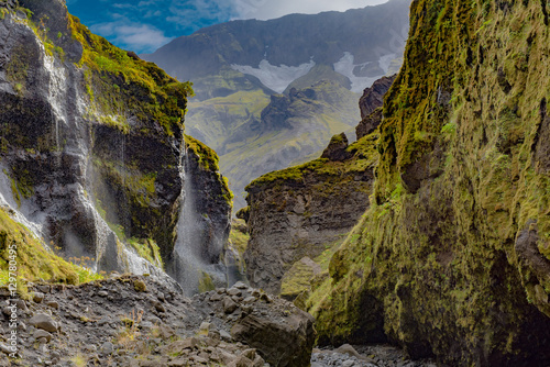 Cascades of white water from the glacier in Stakkholtsgja canyon