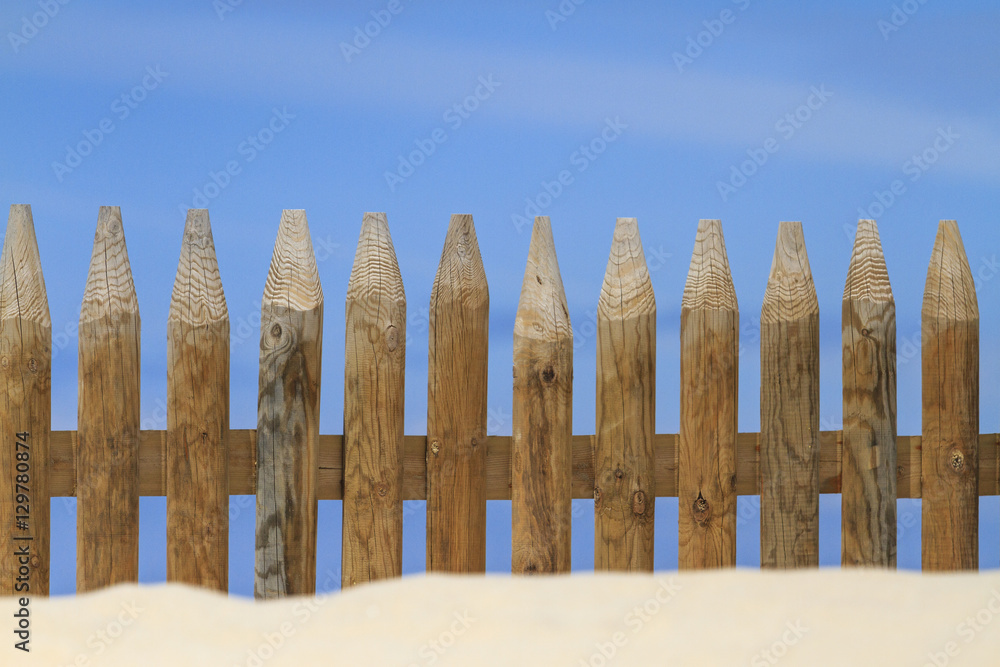 Fototapeta premium wooden fence on the beach