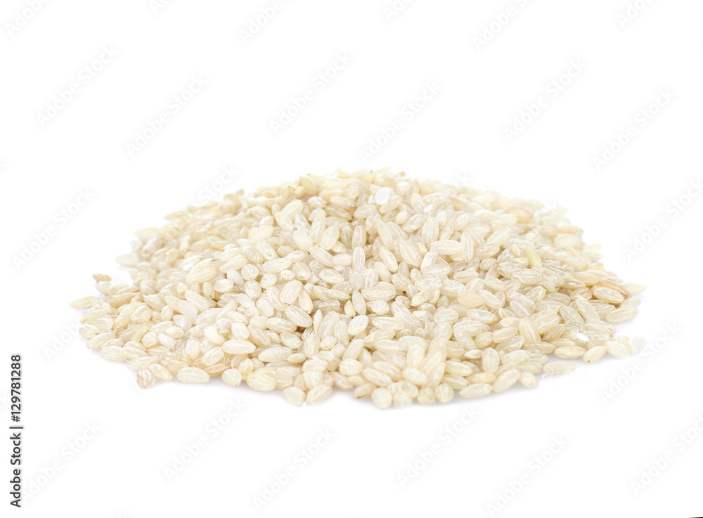 Pile of brown short grain rice isolated on white Pile of brown short grain rice isolated on white