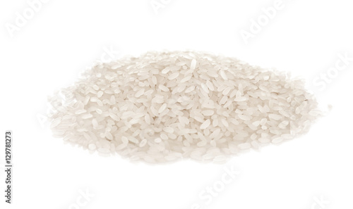 Pile of parboiled long grain rice isolated on white