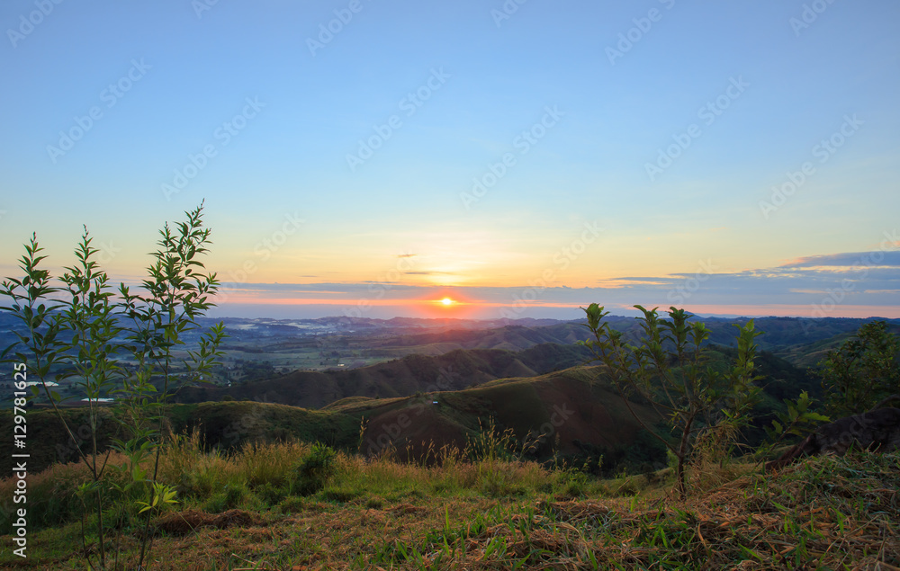 Fototapeta premium Mountain fog light morning sunrise.