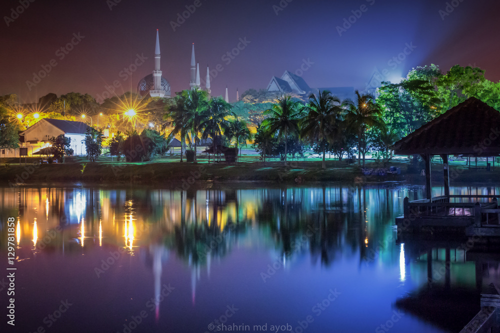 reflection of beautiful mosque by the sea
