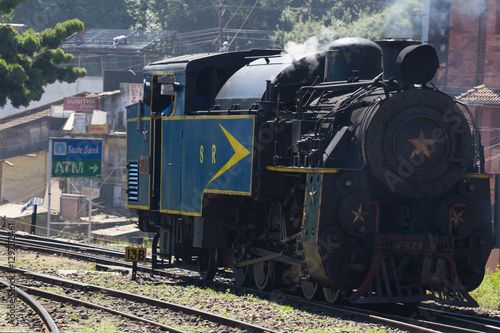 Nilgiri mountain railway. Blue train. Unesco heritage. Narrow-gauge. Steam locomotive in depot