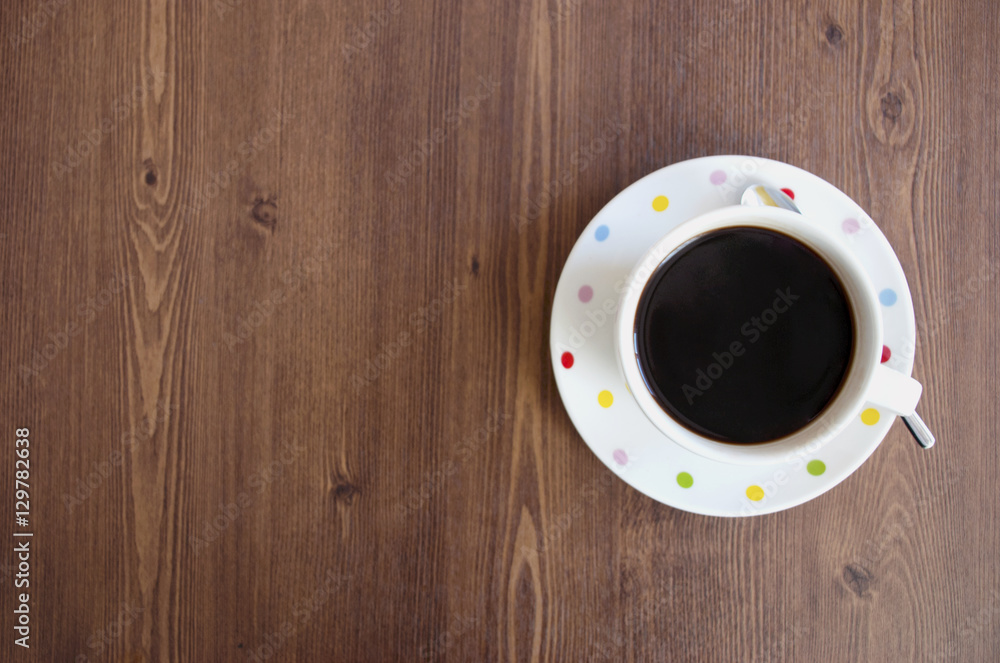 Coffee cup top view on wooden table background Coffee cup top view on wooden table background