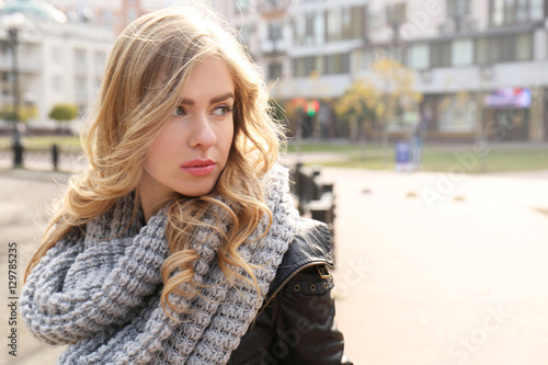 Young beautiful woman walki...