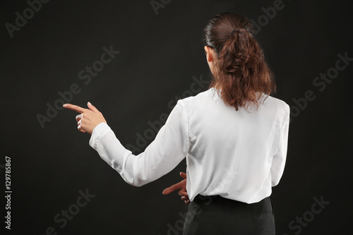 Young businesswoman standin...