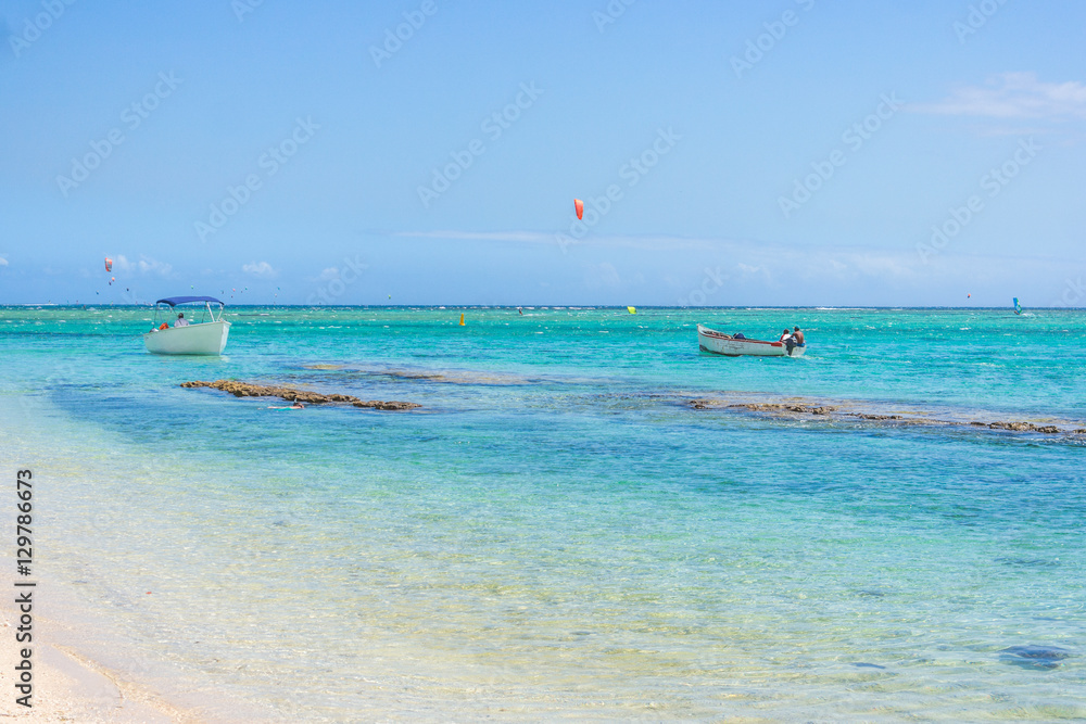 Boat on Idyllic beach on the coast of Mauritius