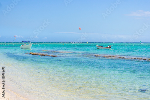 Boat on Idyllic beach on the coast of Mauritius