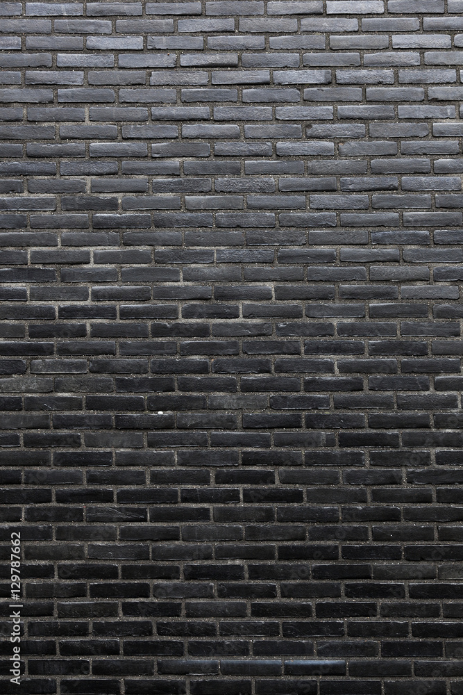 vertical part of wall consisting of black bricks