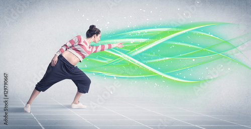 Hip hop dancer posing with green lines