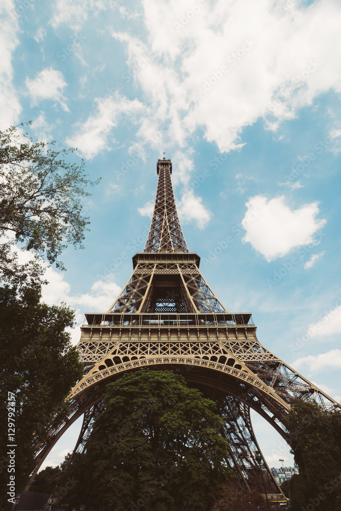 Eiffel Tower. Paris. France. Famous historical landmark on the quay of a river Seine. Romantic, tourist, architecture symbol.