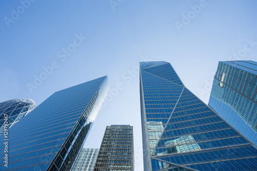 Skyscrapers with glass facade. Modern buildings in Paris business district. Concepts of economics, financial, future.  Copy space for text. Dynamic composition. Toned © sergiymolchenko
