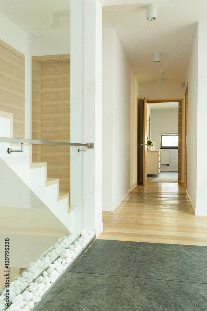 Fototapeta premium Wooden corridor with stairs