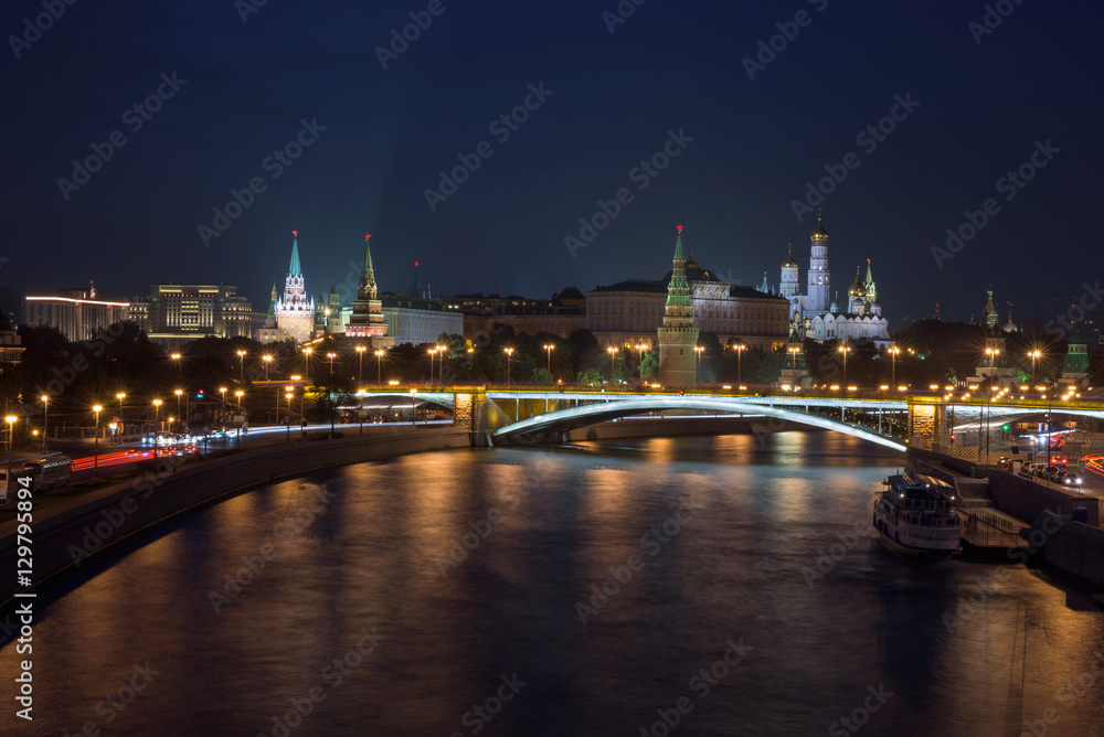 The Moscow Kremlin by night seen across the Moscow river, Moscow, Russian Federation