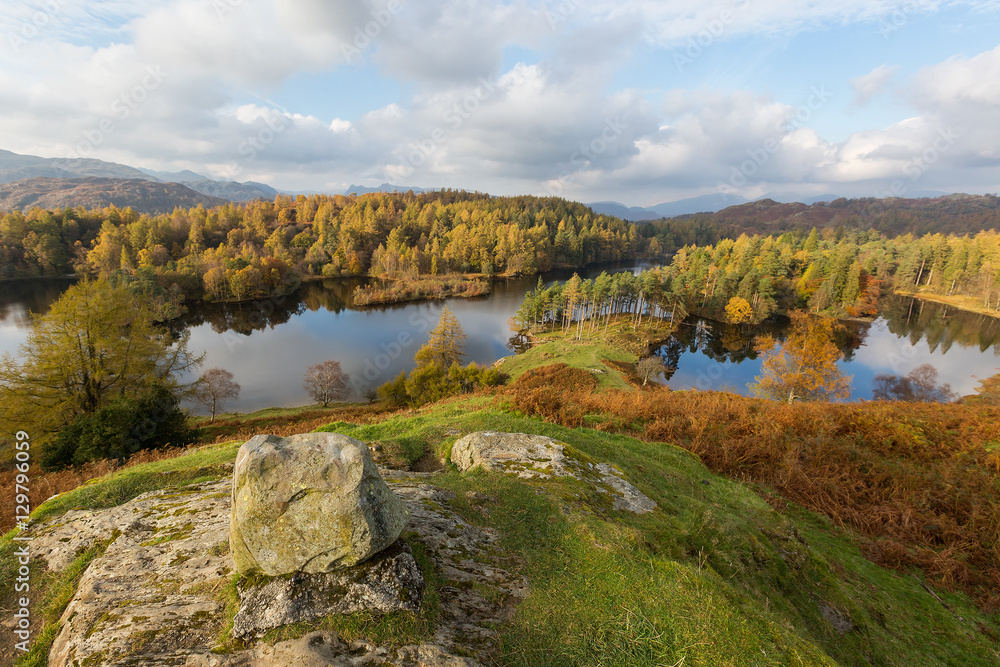 Rocky viewpoint overlooking Tarn Hows in The Lake District, UK