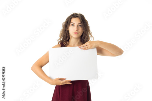 girl in red dress with white placard