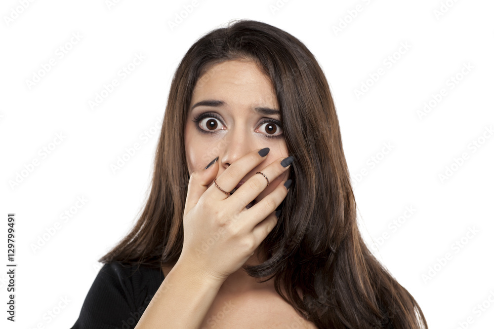 shocked young woman on a white background shocked young woman on a white background