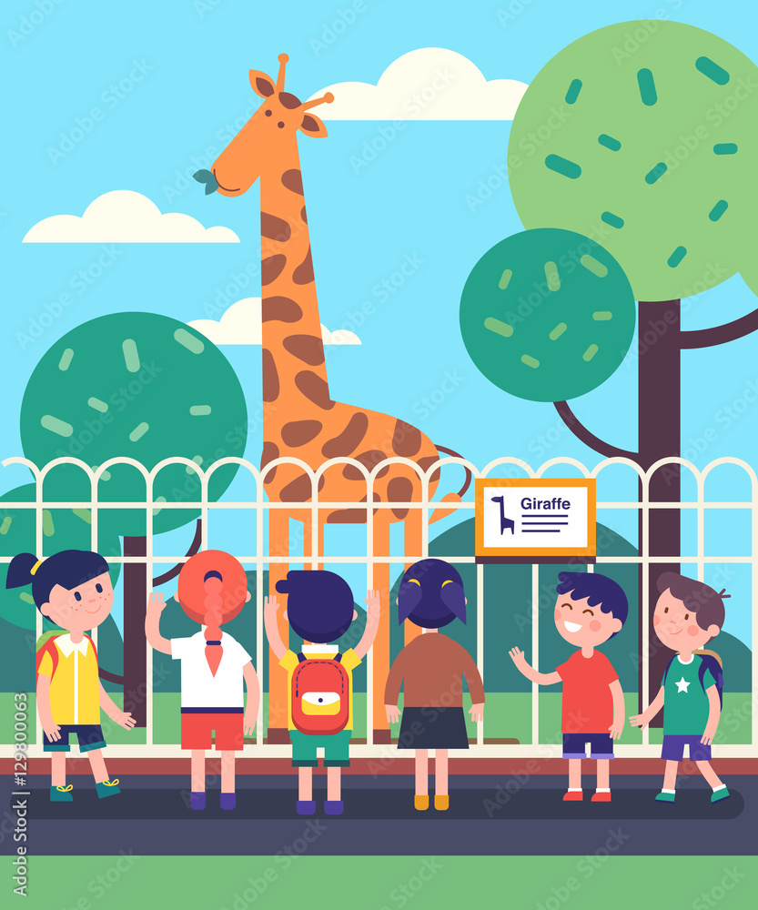 Fototapeta premium Group of kids watching giraffe at a zoo excursion