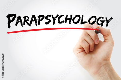 Hand writing Parapsychology with marker, concept background