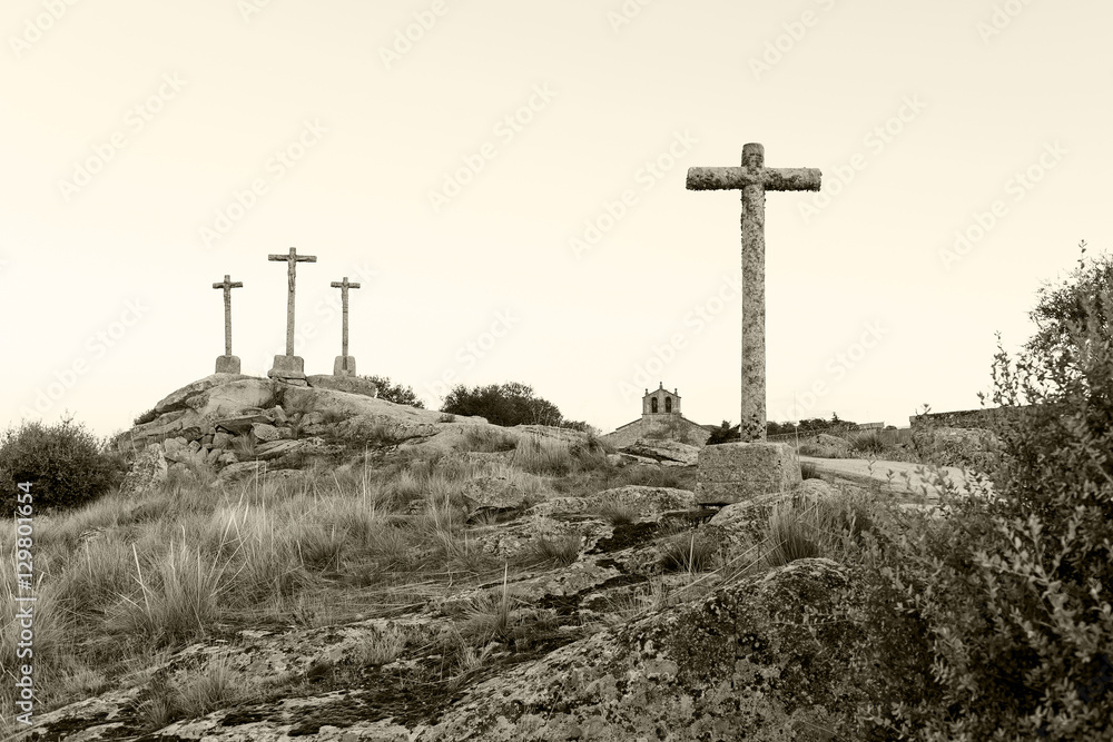 three crosses carved in the stone on fund to the evening three crosses carved in the stone on fund to the evening