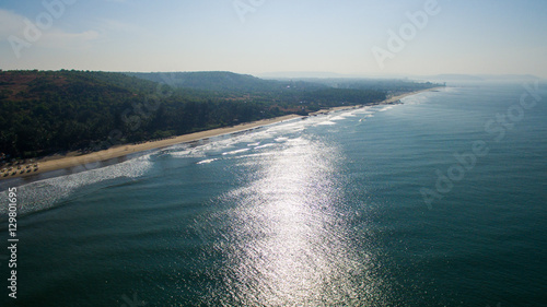 Kalacha beach on sunset. India in Goa. Aerial