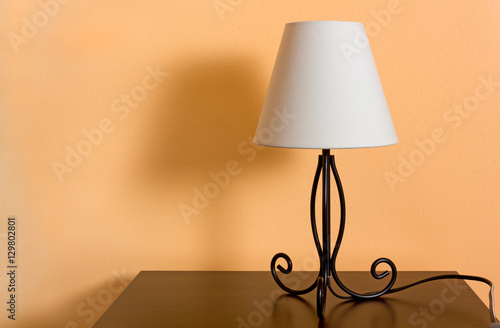 Classic Lamp on a Wooden Bedside Table